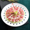 Iberico pork shoulder with garlic stems